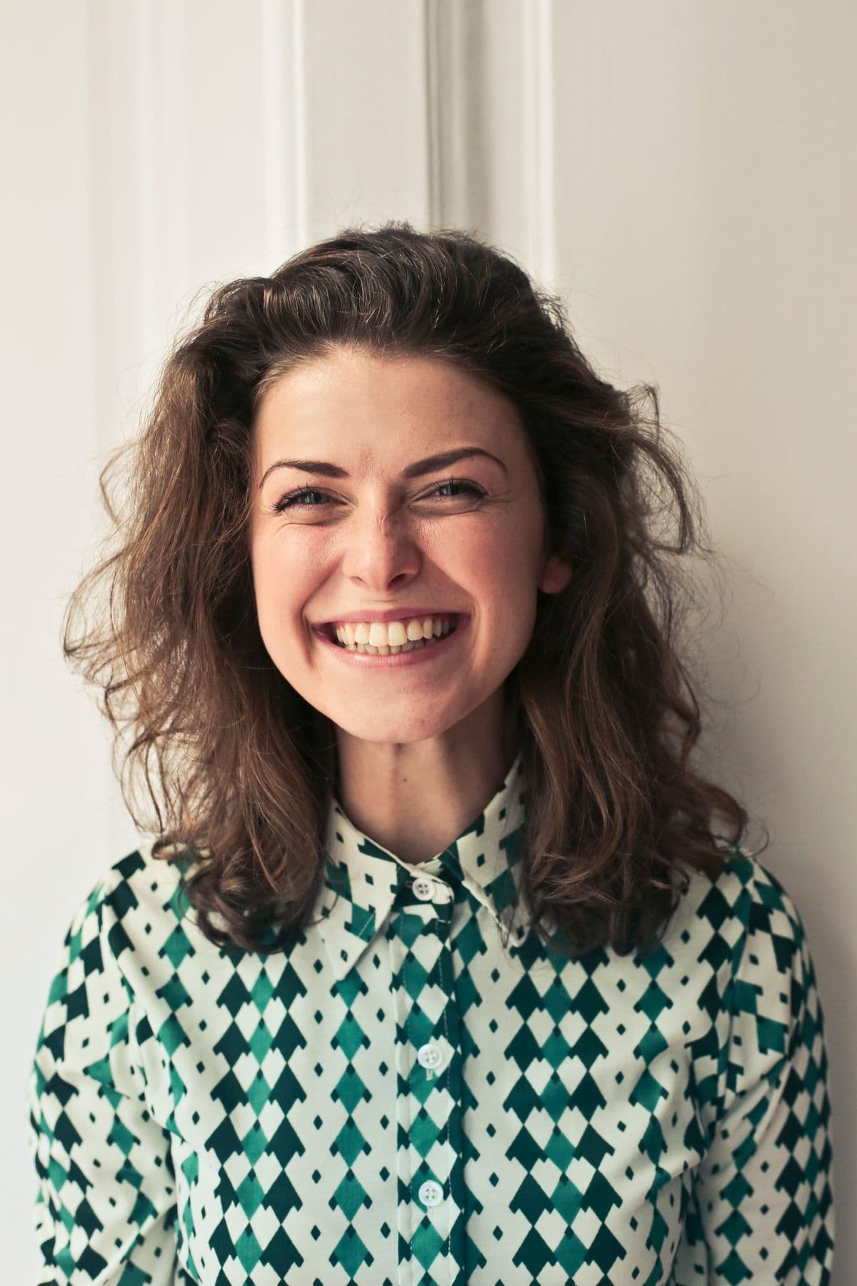 Studio portrait of a woman with even, professional lighting